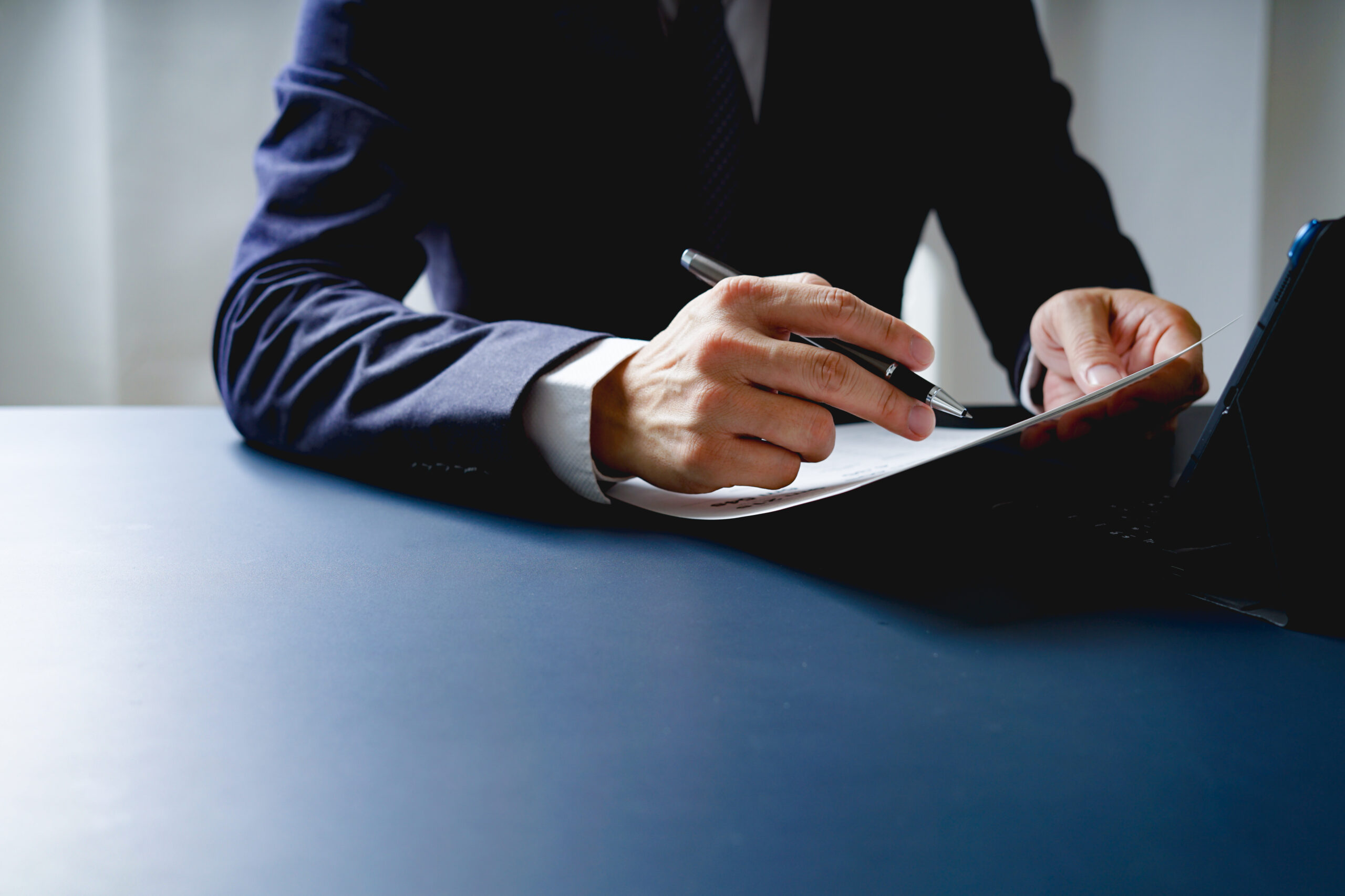 Businessman doing finances and calculate about cost to investmen Businessman doing finances and calculate about cost to investmen